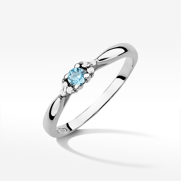 Pierścionek z białego złota z topazem Swiss - próba 585 0,18CT PV-199BTOP