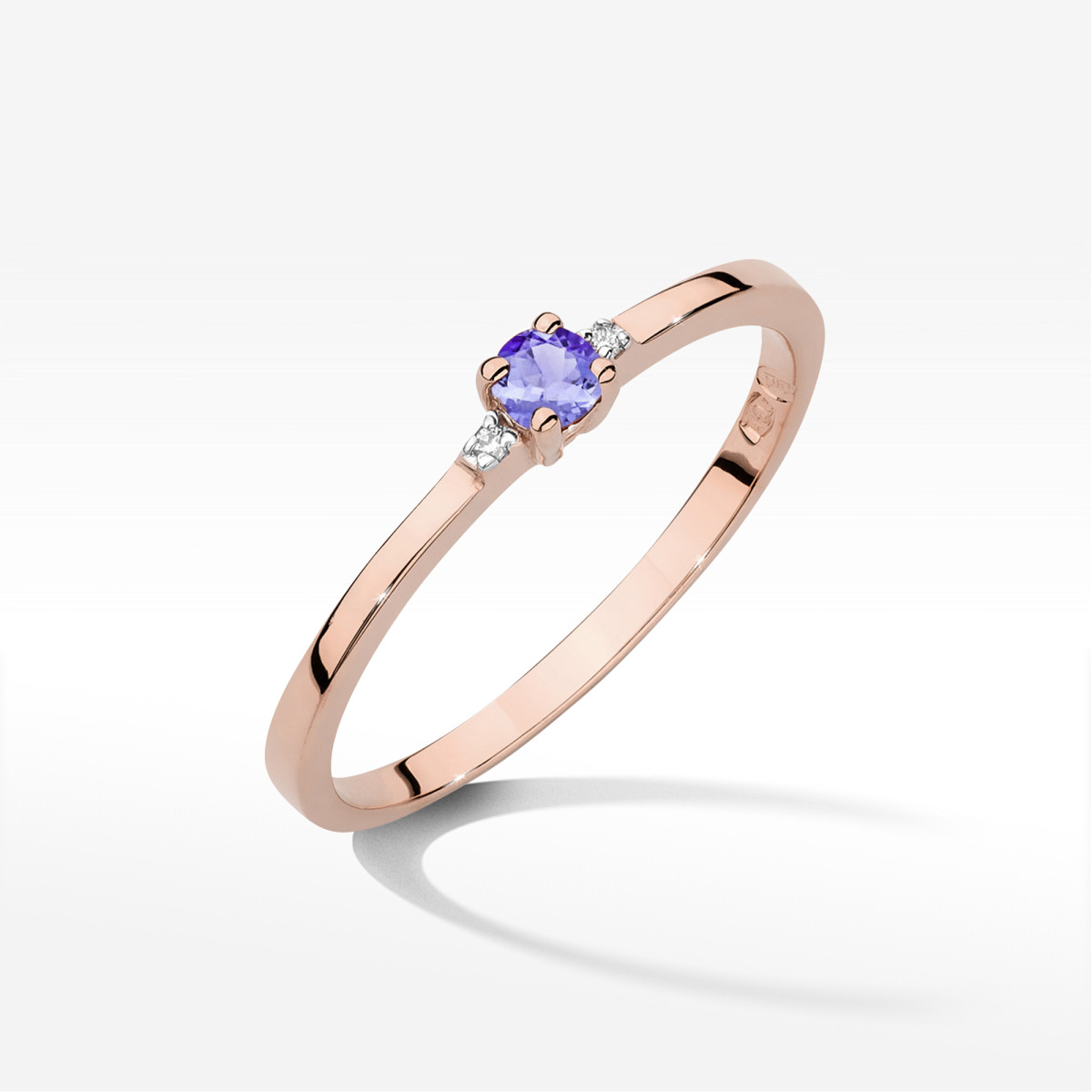 Pierścionek z różowego złota z tanzanitem - próba 585 0,17CT w0464.R3.TAP.01