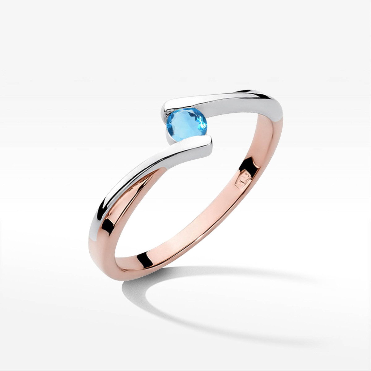 Pierścionek z różowego złota z topazem Swiss - próba 585 0,15CT w0180.R3.TOB.01