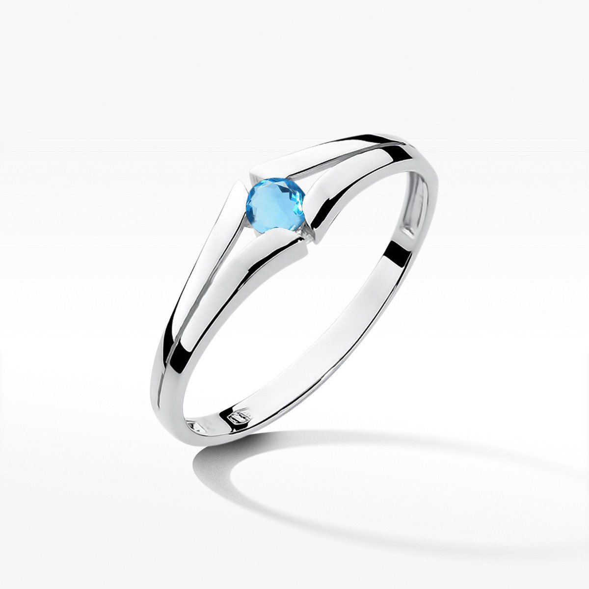 Pierścionek z białego złota z topazem Swiss - próba 585 0,15CT w0207.B3.TOB.01