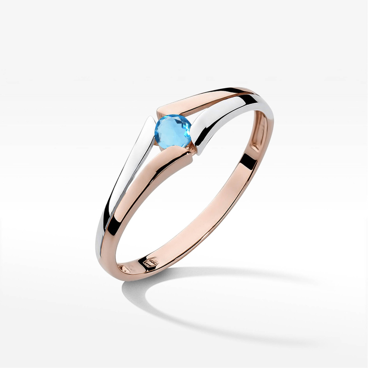 Pierścionek z różowego złota z topazem Swiss - próba 585 0,15CT w0207.R3.TOB.01