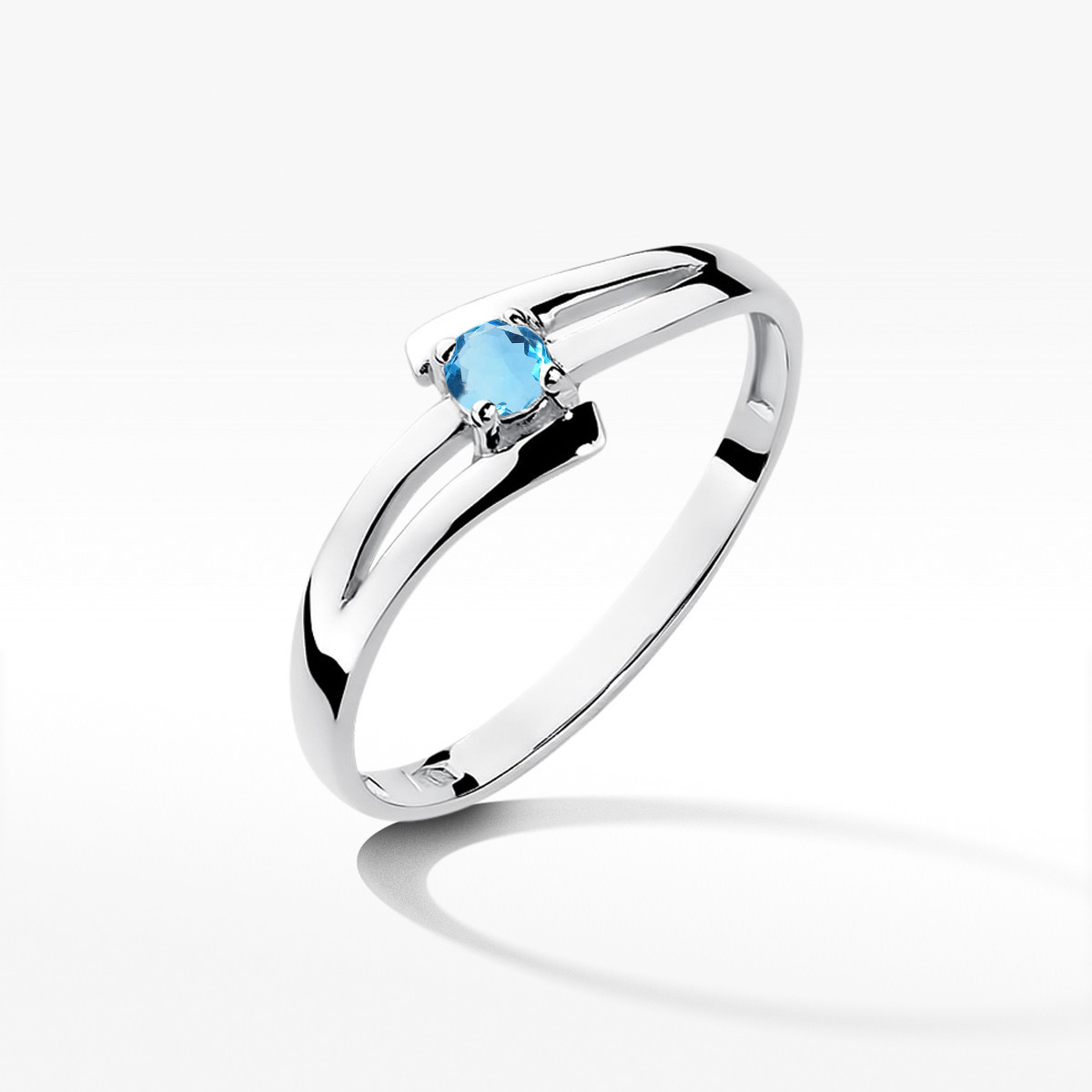 Pierścionek z białego złota z topazem Swiss - próba 585 0,15CT w0210.B3.TOB.01
