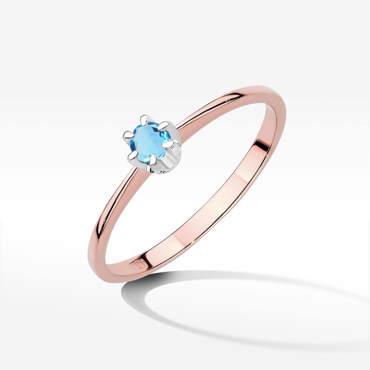 Pierścionek z różowego złota z topazem Swiss - próba 585 0,15CT w0220.R3.TOB.02