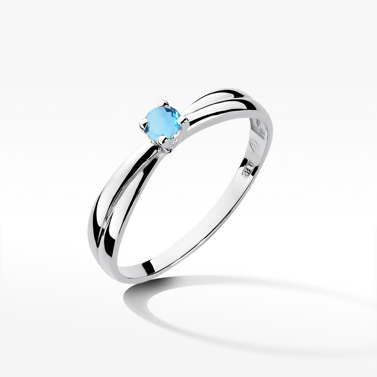 Pierścionek z białego złota z topazem Swiss - próba 585 0,15CT w0230.B3.TOB.02