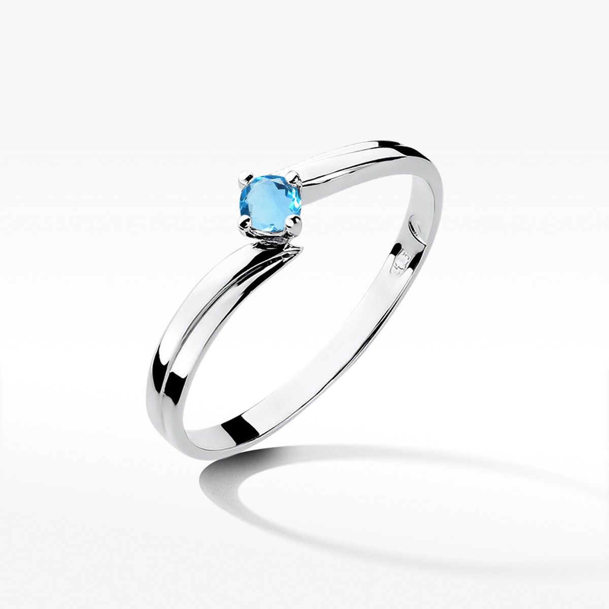 Pierścionek z białego złota z topazem Swiss - próba 585 0,15CT w0231.B3.TOB.02