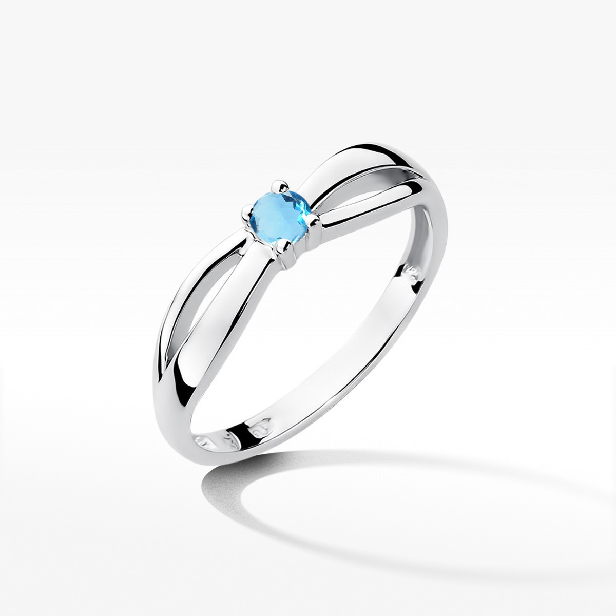 Pierścionek z białego złota z topazem Swiss - próba 585 0,15CT w0248.B3.TOB.01