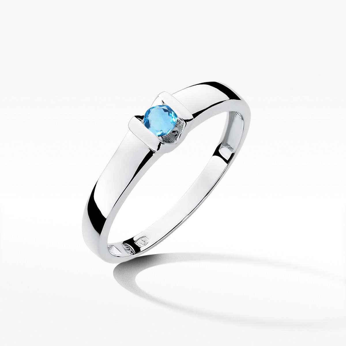 Pierścionek z białego złota z topazem Swiss - próba 585 0,15CT w0249.B3.TOB.01