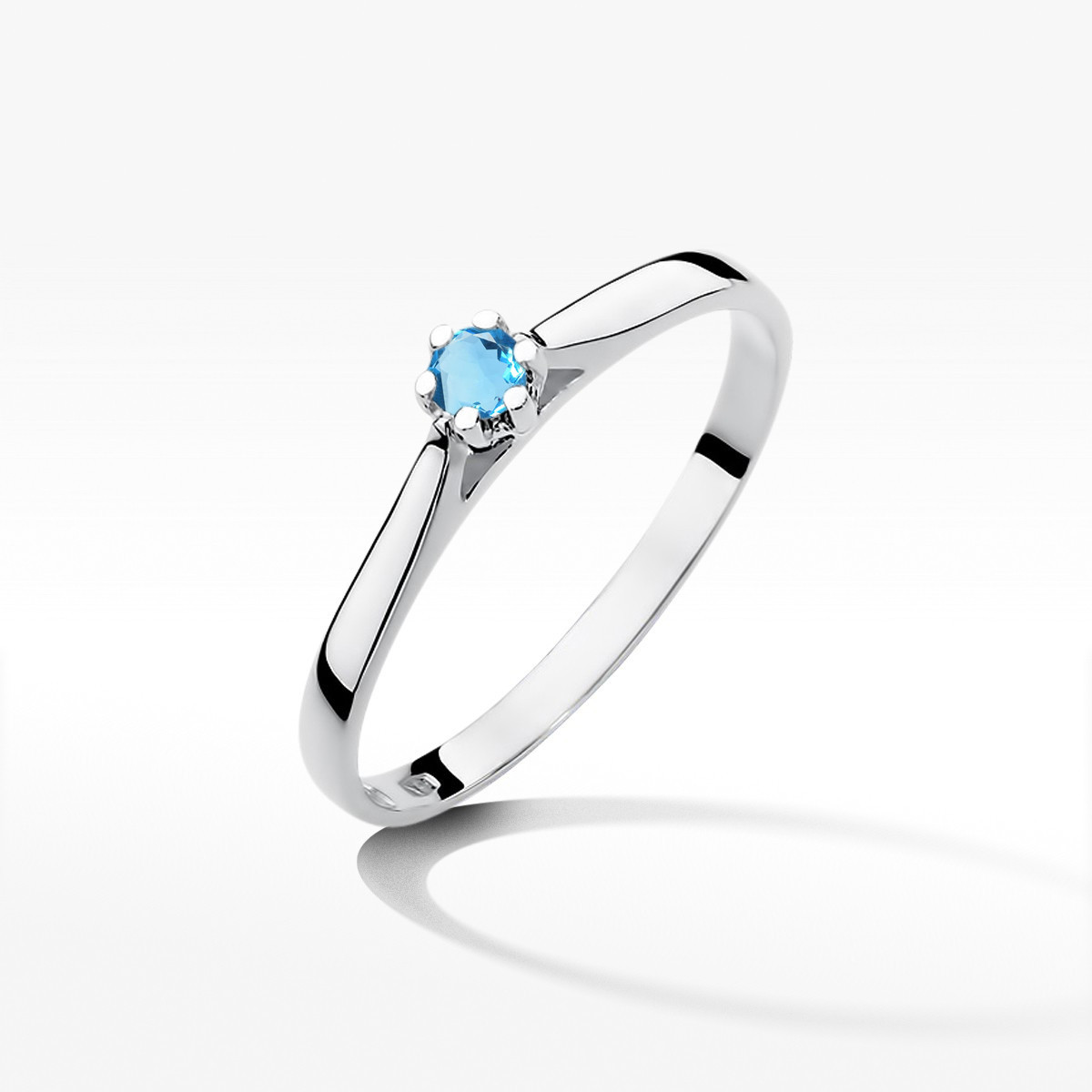 Pierścionek z białego złota z topazem Swiss - próba 585 0,15CT w0311.B3.TOB.02