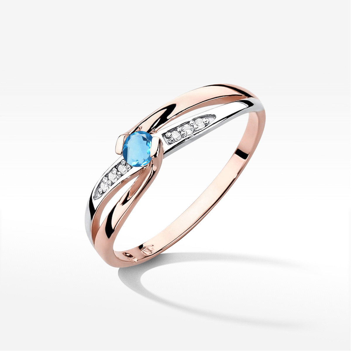 Pierścionek z różowego złota z topazem Swiss - próba 585 0,28CT w0415.R3.TOB.01