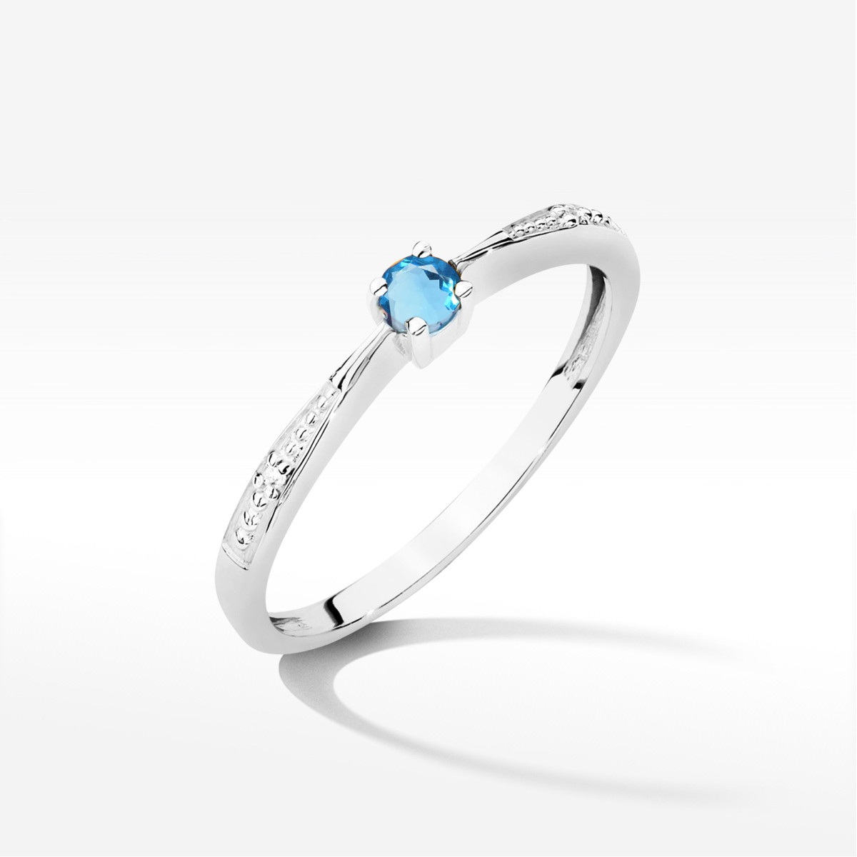 Pierścionek z białego złota z topazem Swiss - próba 585 0,17CT PV-236.B3.TOB.01