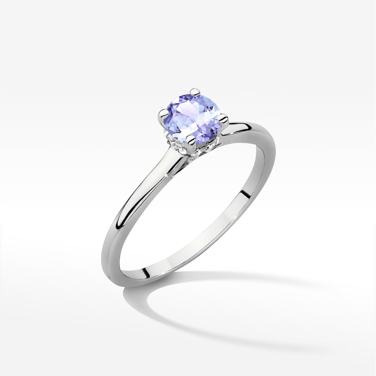 Pierścionek z białego złota z tanzanitem - próba 585 0,56CT w0547.B3.TAP.02