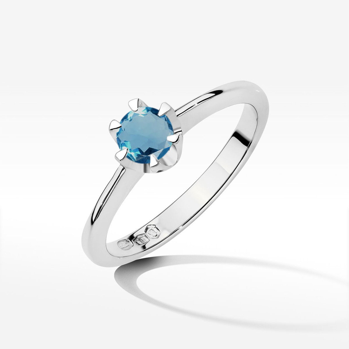 Pierścionek z białego złota z topazem London Blue - próba 585 0,50CT w0220.B3.TOL.10