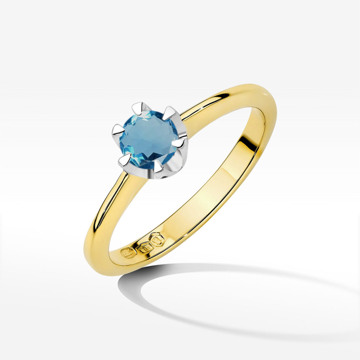 Pierścionek z żółtego złota z topazem London Blue - próba 585 0,50CT w0220.Z3.TOL.10