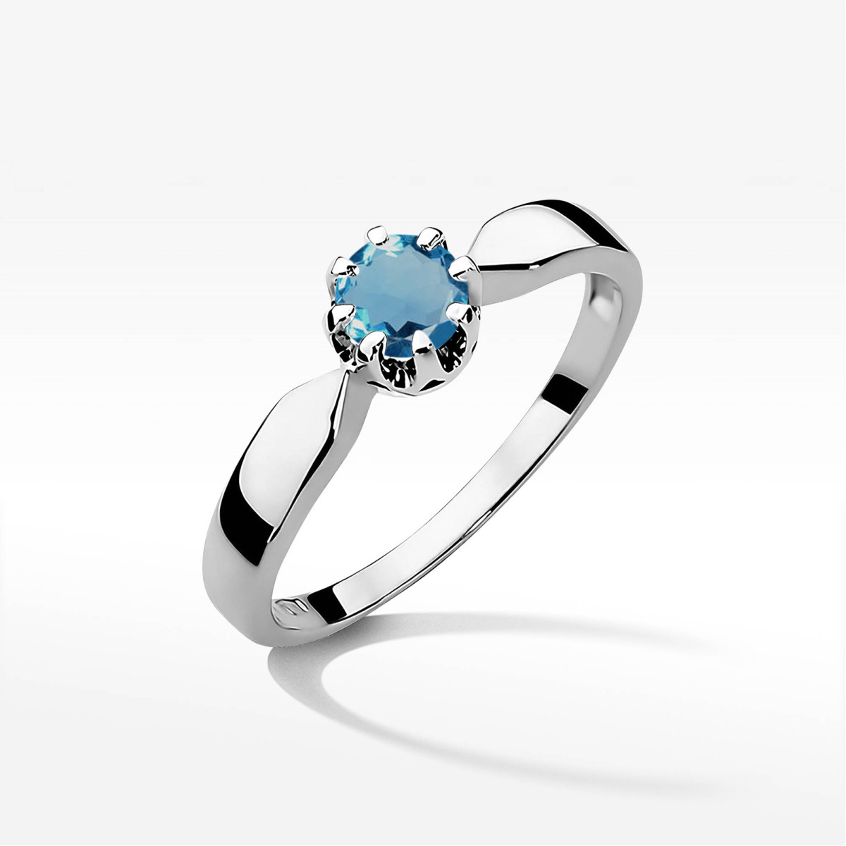 Pierścionek z białego złota z topazem London Blue - próba 585 0,50CT w0228.B3.TOL.07