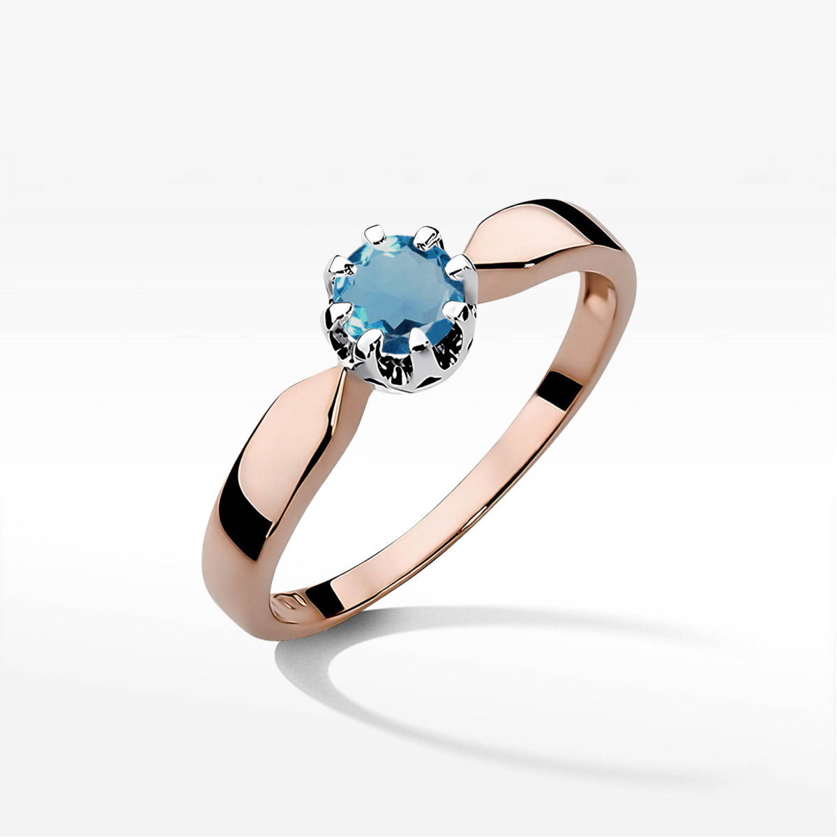 Pierścionek z różowego złota z topazem London Blue - próba 585 0,50CT w0228.R3.TOL.07