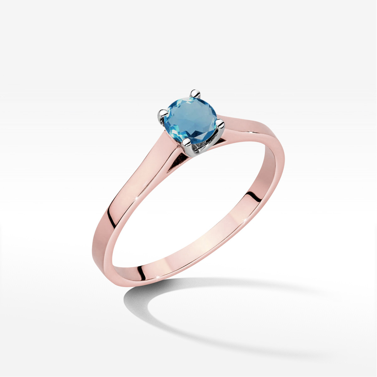 Pierścionek z różowego złota z topazem London Blue - próba 585 0,50CT w0526.R3.TOL.02