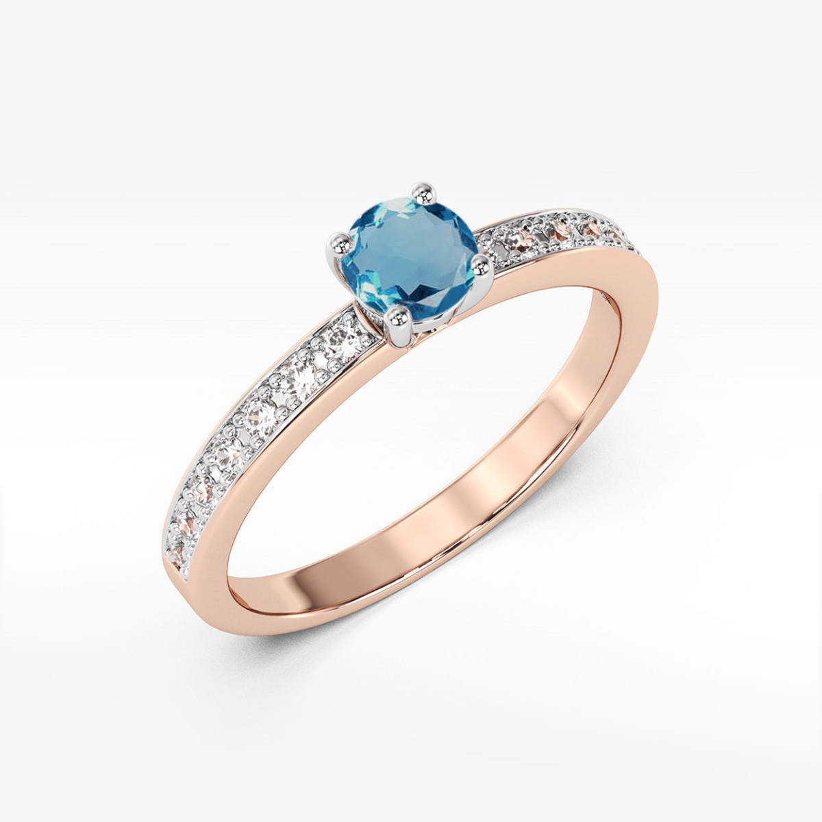 Pierścionek z różowego złota z topazem London Blue - próba 585 0,703CT w0534.R3.TOL.03