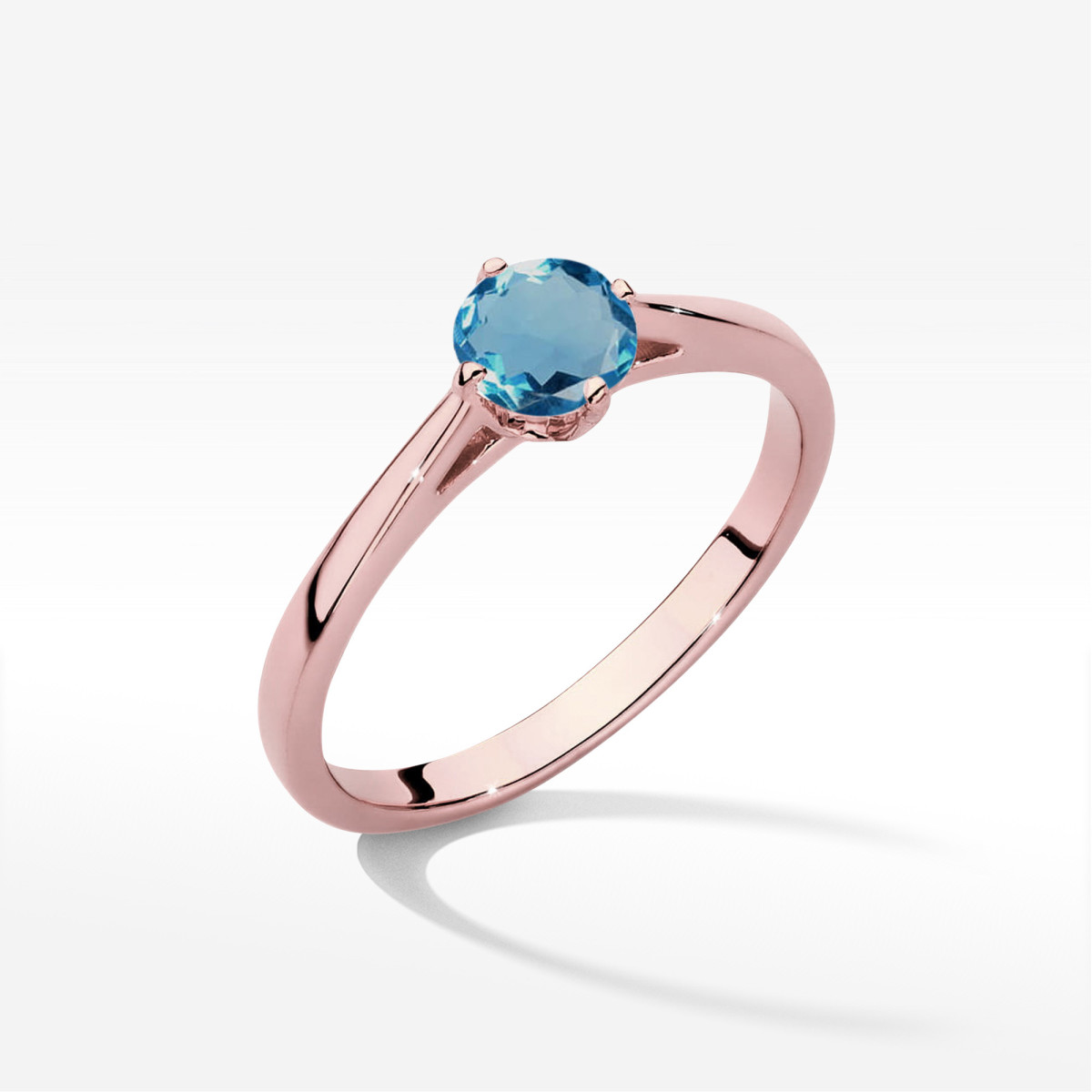 Pierścionek z różowego złota z topazem London Blue - próba 585 0,50CT w0543.R3.TOL.02