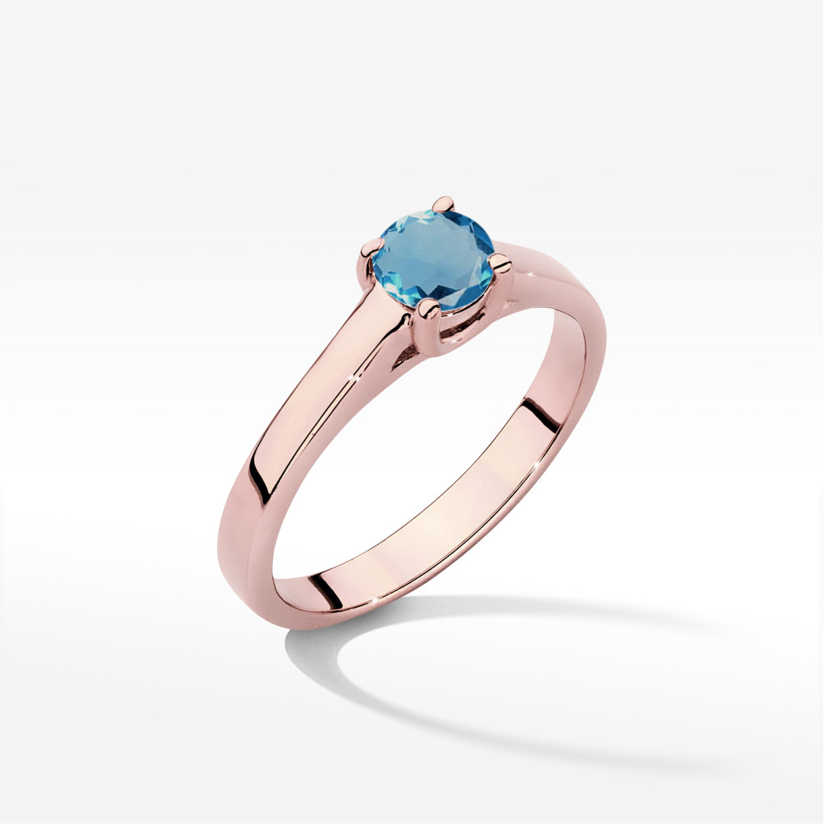 Pierścionek z różowego złota z topazem London Blue - próba 585 0,50CT w0544.R3.TOL.02