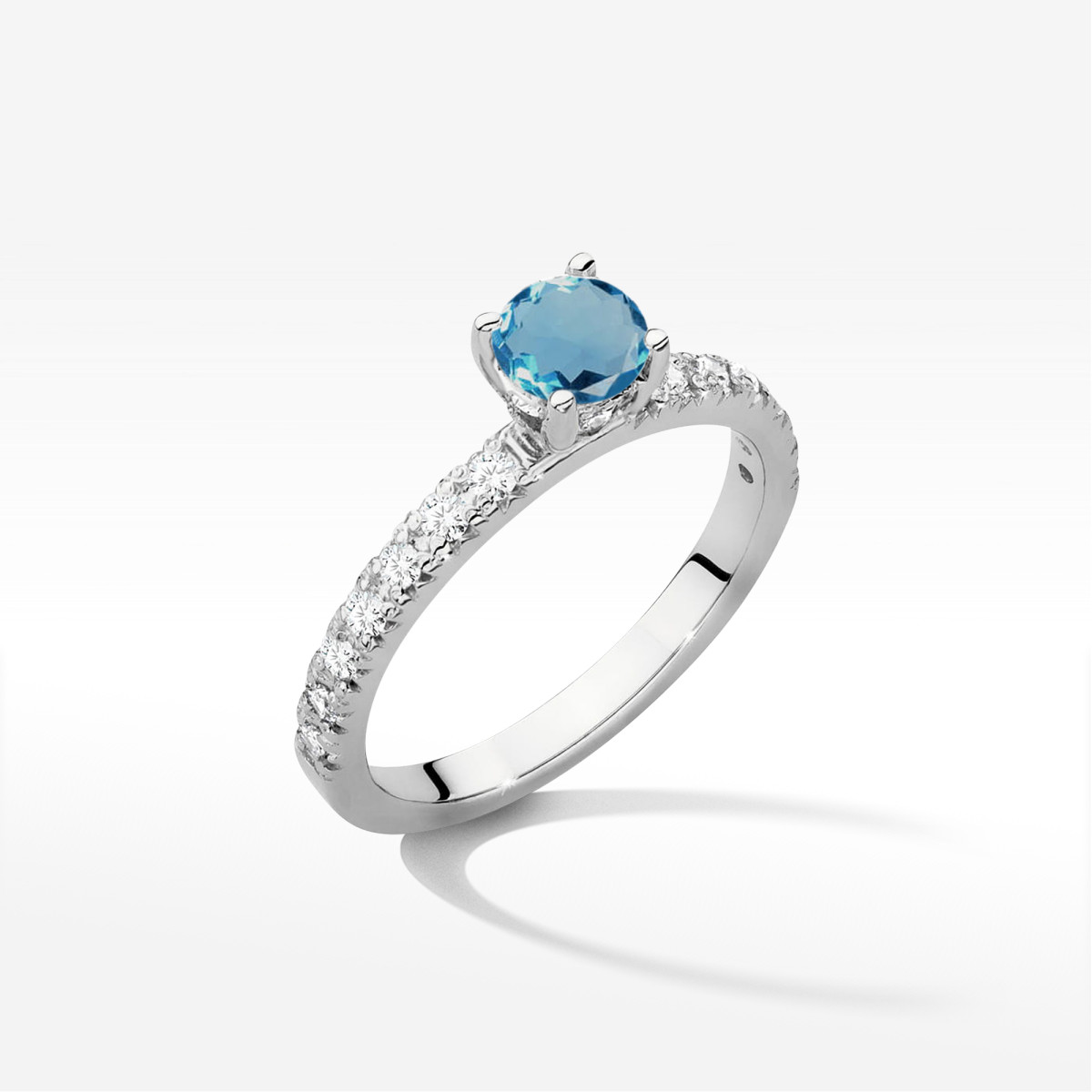 Pierścionek z białego złota z topazem London Blue - próba 585 0,743CT w0546.B3.TOL.02