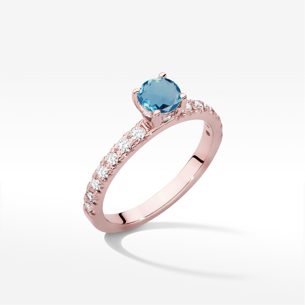 Pierścionek z różowego złota z topazem London Blue - próba 585 0,743CT w0546.R3.TOL.02
