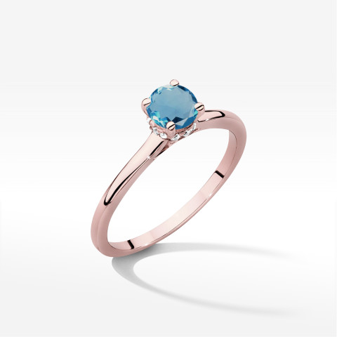 Pierścionek z różowego złota z topazem London Blue - próba 585 0,56CT w0547.R3.TOL.02