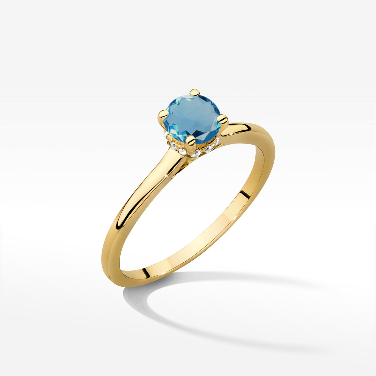 Pierścionek z żółtego złota z topazem London Blue - próba 585 0,56CT w0547.Z3.TOL.02