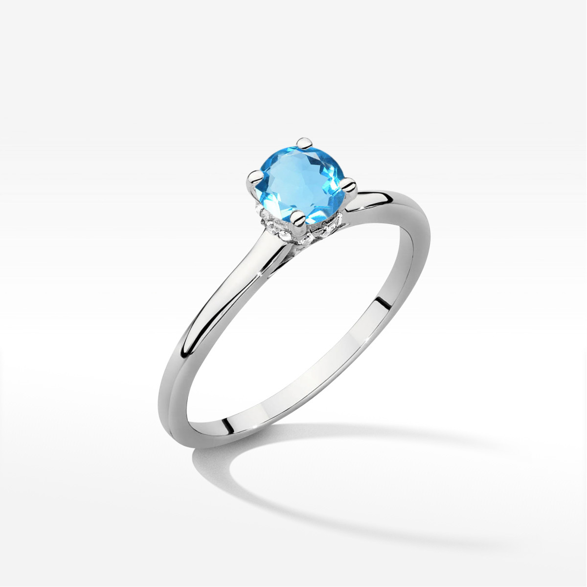 Pierścionek z białego złota z topazem Swiss - próba 585 0,56CT w0547.B3.TOB.02
