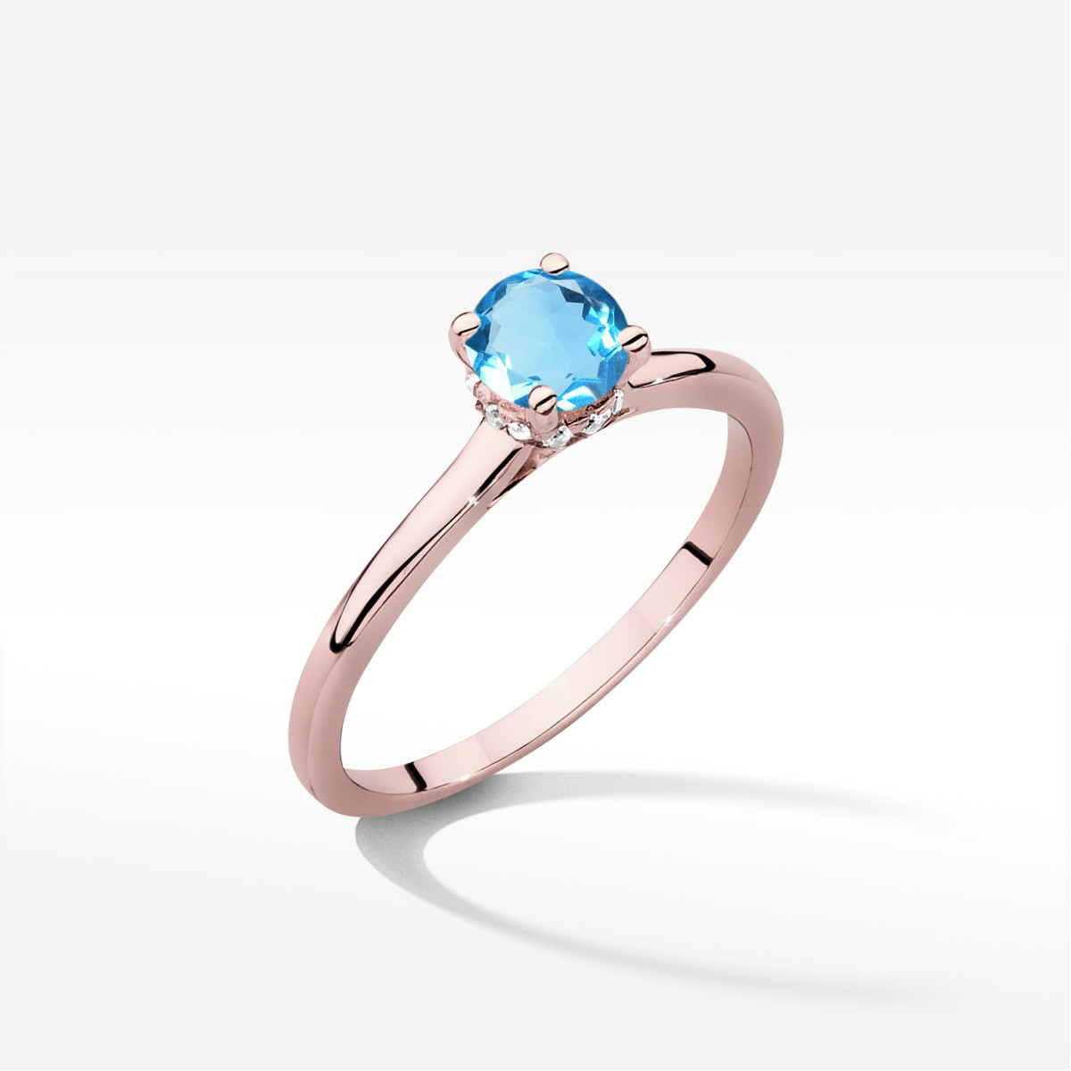 Pierścionek z różowego złota z topazem Swiss - próba 585 0,56CT w0547.R3.TOB.02