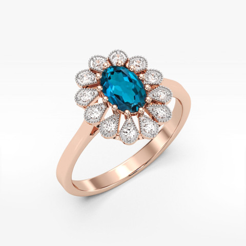 Pierścionek z różowego złota z topazem London Blue - próba 585 0,603CT PV-298.R3.TOL.01