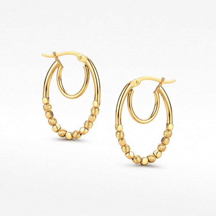 Kolczyki ze złota koła ze złotymi koralikami
