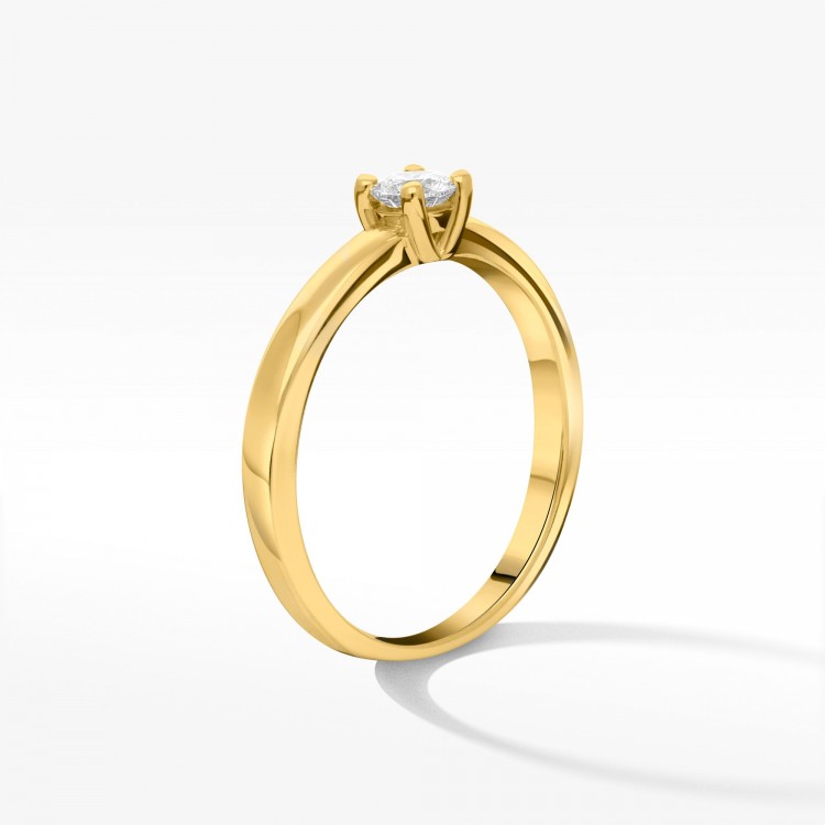 Klasyczny złoty pierścionek z brylantem