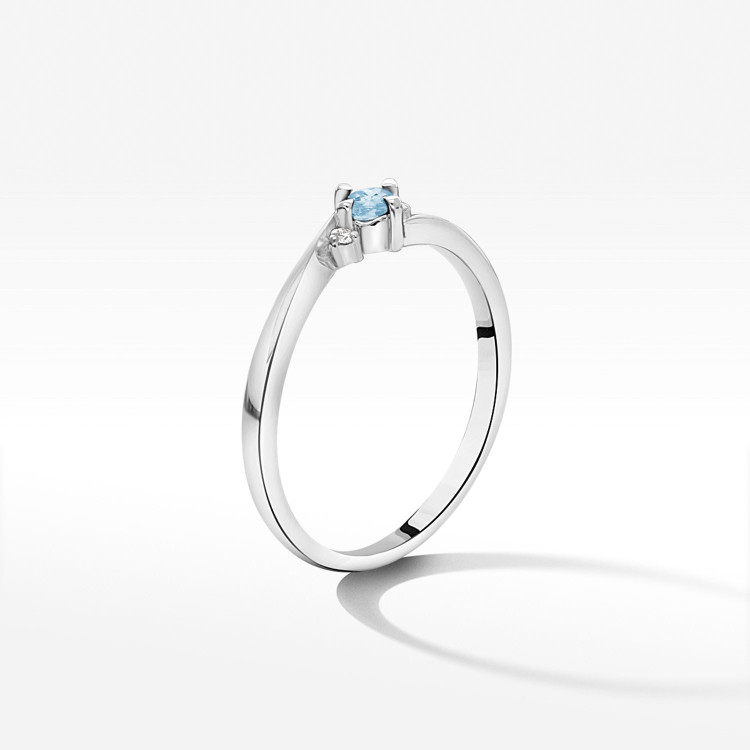 Pierścionek z białego złota z topazem Swiss - próba 585 0,167CT PV-205BT