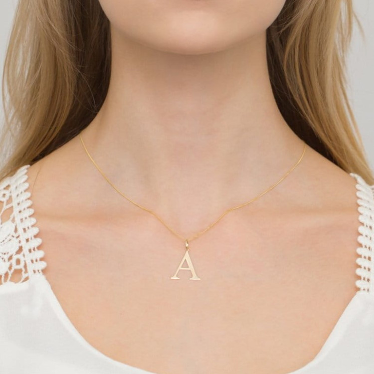 Zawieszka z żółtego złota z diamentem - próba 585 0,005CT Literka A