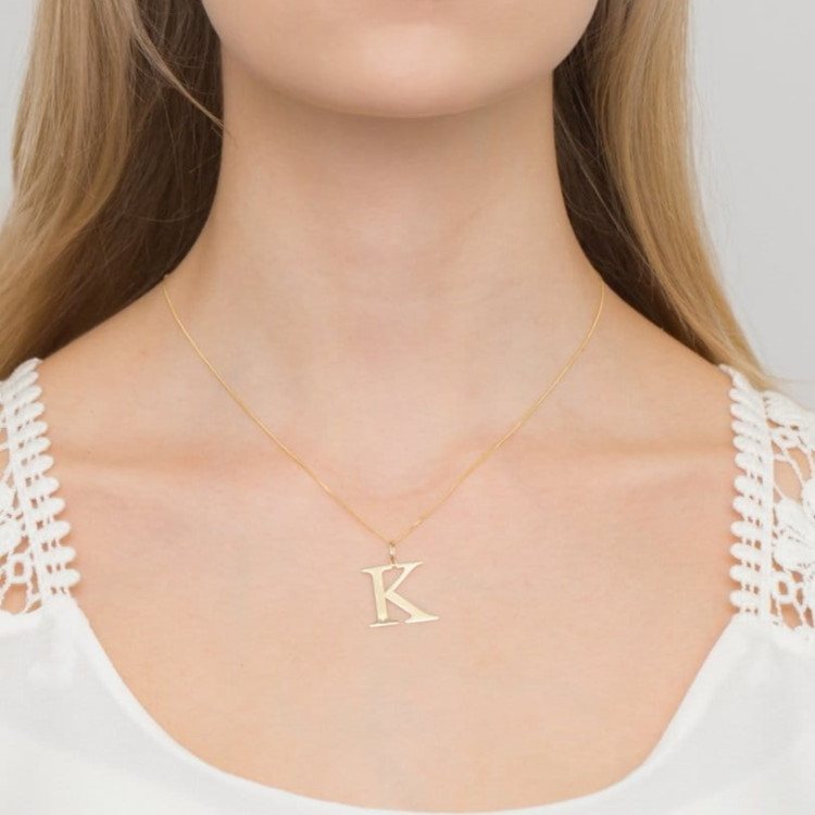 Zawieszka z żółtego złota z diamentem - próba 585 0,005CT LITERKA K