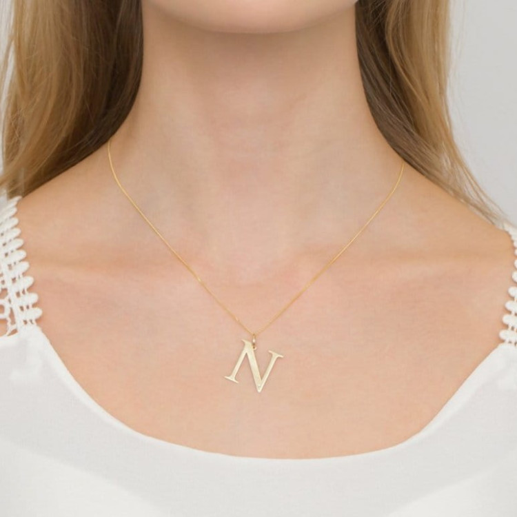 Zawieszka z żółtego złota z diamentem - próba 585 0,005CT LITERKA N
