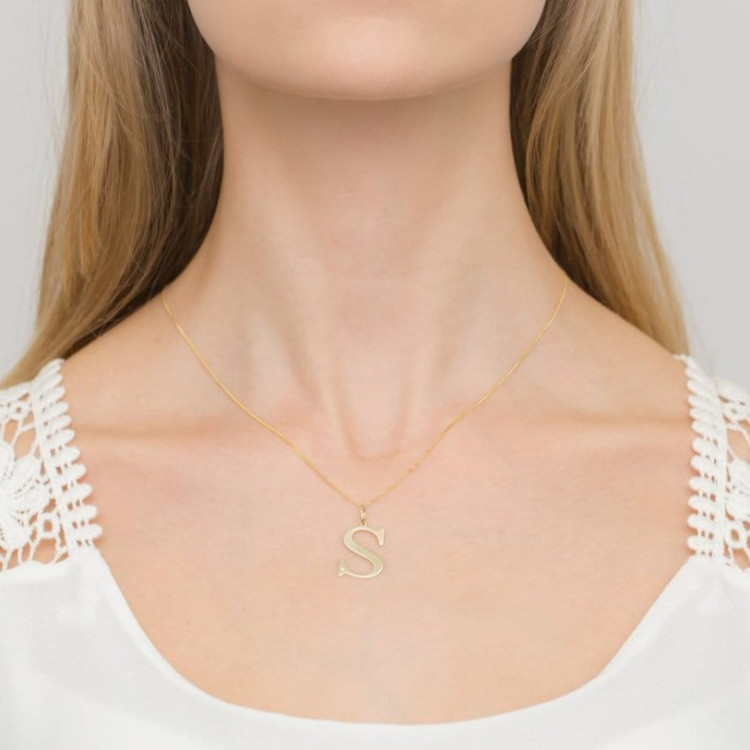 Zawieszka z żółtego złota z diamentem - próba 585 0,005CT LITERKA S