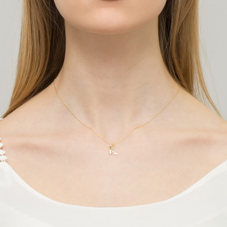 Zawieszka z żółtego złota z diamentem - próba 585 0,005CT m LITERKA K
