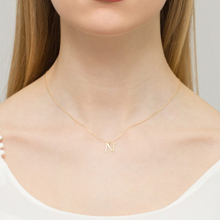 Zawieszka z żółtego złota z diamentem - próba 585 0,005CT m LITERKA N